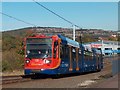 Supertram travelling parallel to Woodbourn Road, Sheffield 9