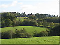 Plawhatch Hall from footpath above Plaw Wood