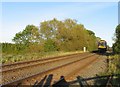 SK7918 : Train to Birmingham approaching Wyfordby level crossing by Andrew Tatlow