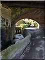 Underneath railway bridge over Jumble Hole Road