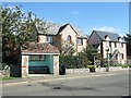 Houses and bus shelter in Brighstone