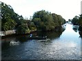 Fishing from a boat on the River Avon