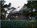 A new roof goes onto the church of St John the Baptist, Hughley