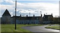 Terraced houses by a Poundbury roundabout