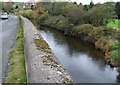 The Moneycarragh River running alongside the B180 at Moneycarragh Bridge