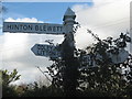 Signpost with ivy