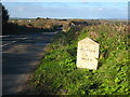 Milestone beside the B3293 at Garras