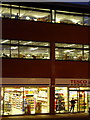 Bournemouth: nighttime detail of the library and Tesco Express