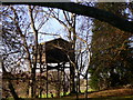 House on stilts by bridleway