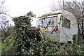 SY1198 : East Devon : Abandoned Caravan by Lewis Clarke