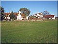 SO8748 : Houses on the edge of the common by Trevor Rickard