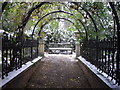 Bench at entrance to Collingham Gardens London