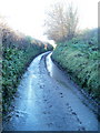 Road to A48 heads away from Ffordd Cottage