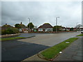 Looking across Alinora Crescent and towards Sandown Avenue