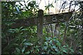 A gradient post beside the River Caen where once was the Barnstaple to Ilfracombe line