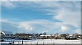 Snow bearing cumulo-nimbus clouds above Ysgol Brynrefail