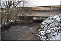 A bridge over the river Caen on Vellator Way as seen from downstream