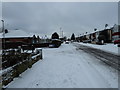 Junction of Homefield Road and a snowy Central Road