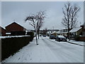 Looking up a snowyLealand Road towards the Havant Road