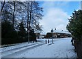 Road signs in a snowy Waterworks Road