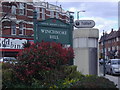 Sign for Winchmore hill with public toilet, Green Lanes