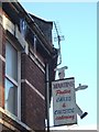Icicles and shop sign in Pinhoe Road