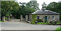 Lodge and gate piers near Kirkharle