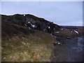 SJ0936 : Walkers at the memorial to Wayfarer at Pen Bwlch Llandrillo at dusk by Jeremy Bolwell