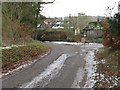 Post box on sharp bend on eastern side of Madehurst