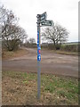 Signpost at the junction of Mill Lane and Moor Lane