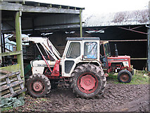SJ8759 : Tractors graveyard (2) by Stephen Craven