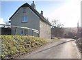 Thatched cottage, at Rodhuish Cross