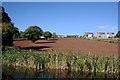 Canal, Field and Houses