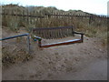 Seat on the promenade at Sutton on Sea