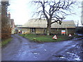 Buildings at road fork at Pond Farm