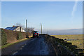 Tractor passing Edge Side Farm