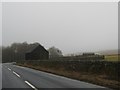 Shed at the side of the B6357 at Gillside