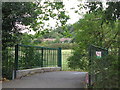 Footbridge over the River Ravensbourne in Queen