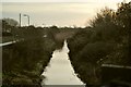 The view upstream from a bridge which carries the Tarka Trail over Knowl Water