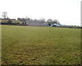 Field and farm buildings viewed from the A48