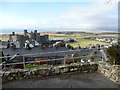 SH5831 : Harlech Castle and Morfa Harlech beyond by Jeremy Bolwell