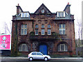 Red sandstone building on Ferguslie