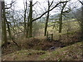 Stile, stream, woodland edge