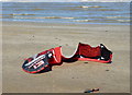 An abandoned kite belonging to one of the surfers on Westgate Bay