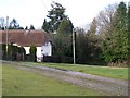 Thatched cottage next to triangular road junction