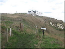 TR2638 : Footpath junction on the cliffs above the Warren by David Anstiss