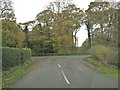 Holt Lane approaching the junction with Sandy Lane