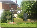 Audlem: village sign at the junction of Shropshire Street (A525) and Green Lane (A529)