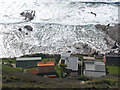 Chalets above the beach at Whitesand Bay