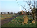 TF5716 : Gravestones near the Green by Richard Humphrey